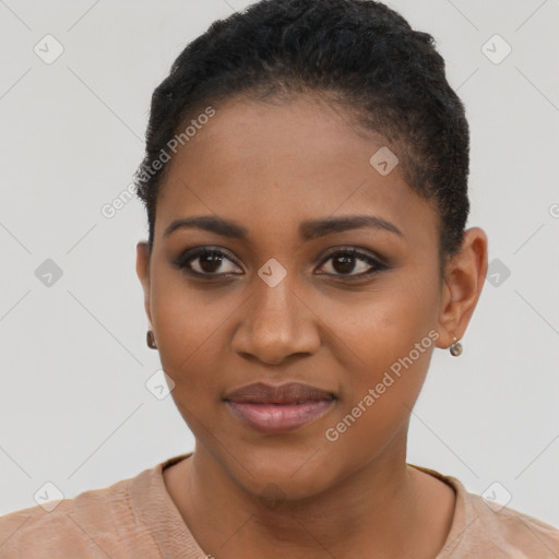 Joyful black young-adult female with short  brown hair and brown eyes