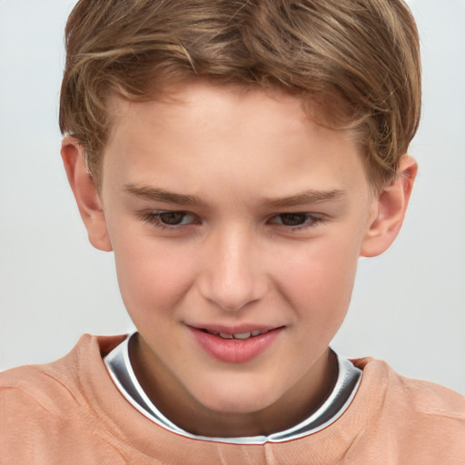 Joyful white child male with short  brown hair and brown eyes