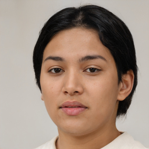 Neutral asian young-adult female with medium  black hair and brown eyes
