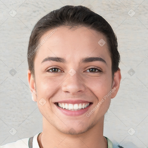 Joyful white young-adult female with short  brown hair and brown eyes