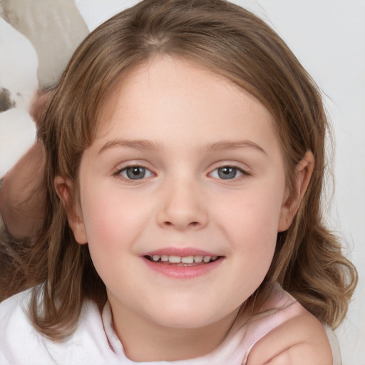 Joyful white child female with medium  brown hair and brown eyes