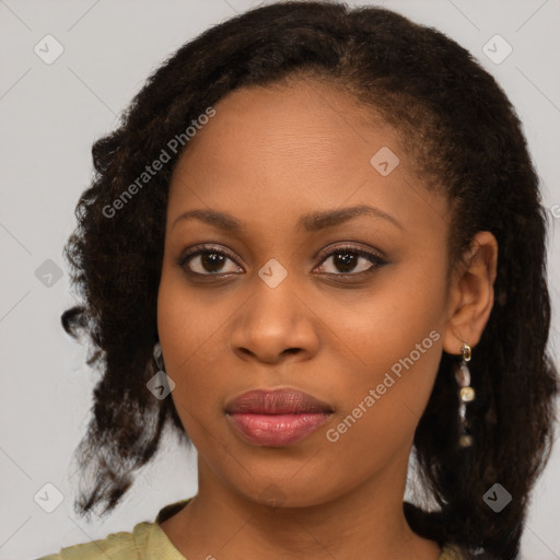 Joyful black young-adult female with medium  brown hair and brown eyes