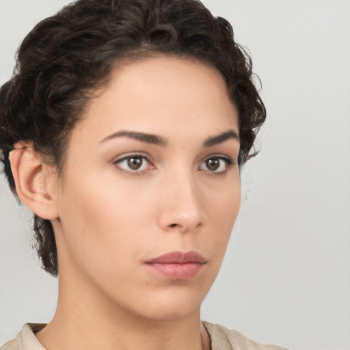 Neutral white young-adult female with short  brown hair and brown eyes