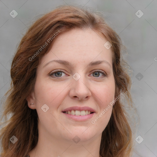 Joyful white young-adult female with medium  brown hair and blue eyes