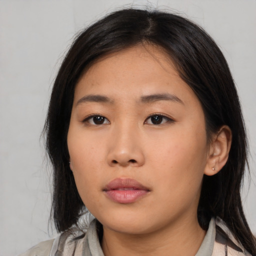 Neutral asian young-adult female with medium  brown hair and brown eyes