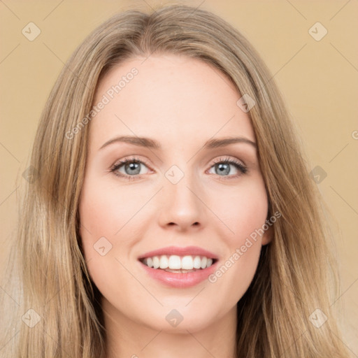 Joyful white young-adult female with long  brown hair and green eyes