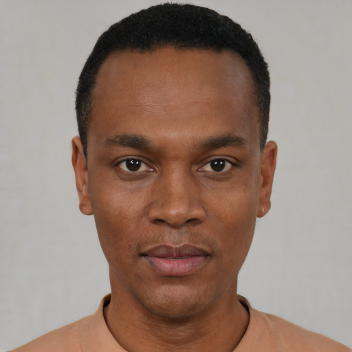 Neutral black young-adult male with short  black hair and brown eyes