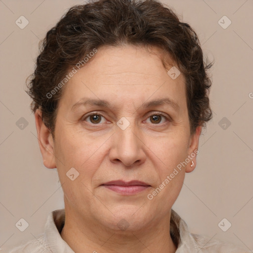 Joyful white adult female with short  brown hair and brown eyes