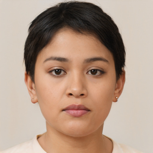 Neutral latino young-adult female with short  brown hair and brown eyes