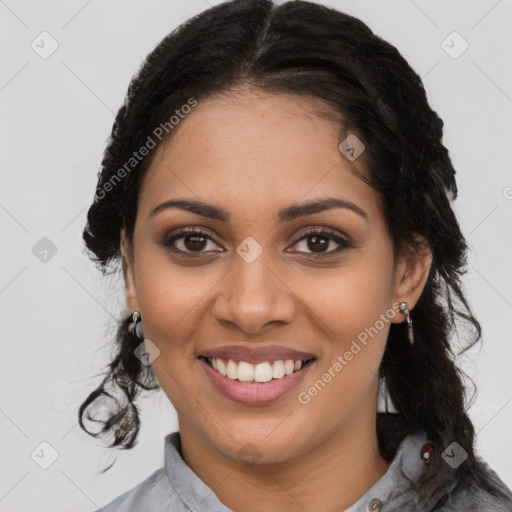 Joyful black young-adult female with medium  brown hair and brown eyes