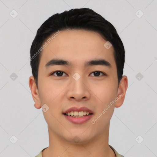 Joyful asian young-adult male with short  black hair and brown eyes