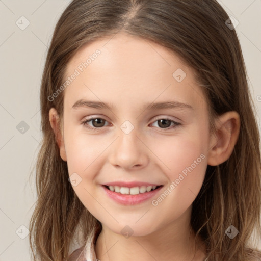 Joyful white child female with long  brown hair and brown eyes