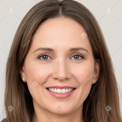 Joyful white young-adult female with long  brown hair and grey eyes