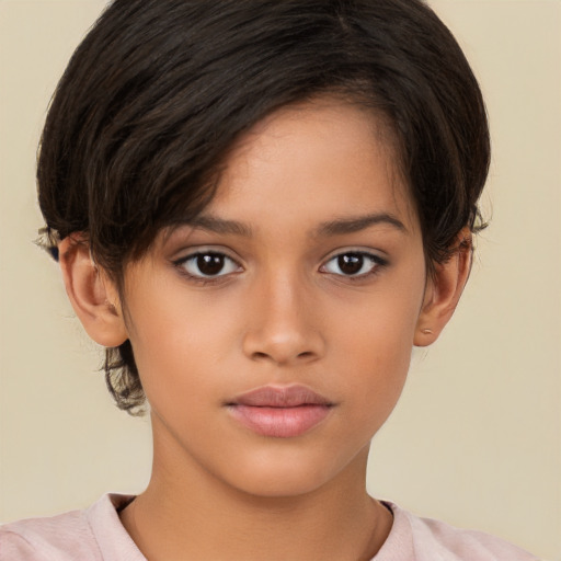 Joyful white child female with short  brown hair and brown eyes