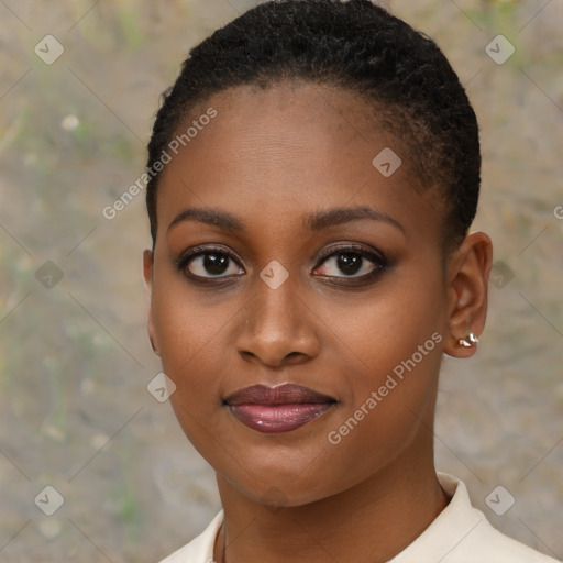 Joyful black young-adult female with short  brown hair and brown eyes