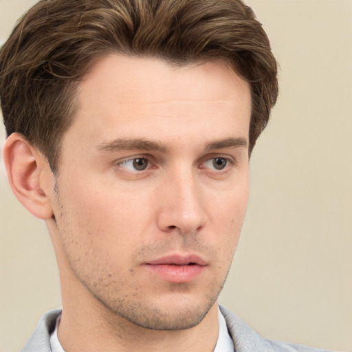 Neutral white young-adult male with short  brown hair and grey eyes