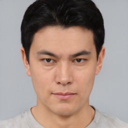 Neutral asian young-adult male with short  black hair and brown eyes