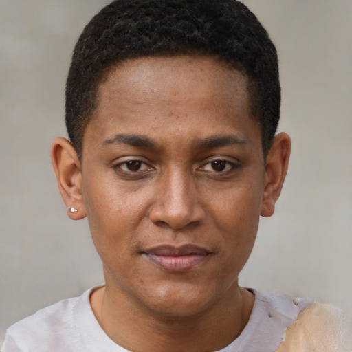 Joyful black young-adult male with short  brown hair and brown eyes