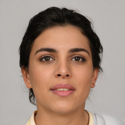 Neutral asian young-adult female with medium  brown hair and brown eyes