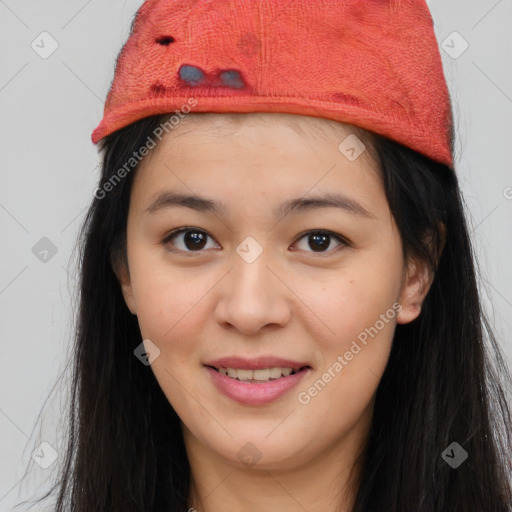 Joyful asian young-adult female with long  brown hair and brown eyes