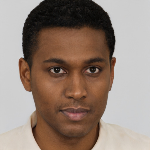 Neutral black young-adult male with short  brown hair and brown eyes