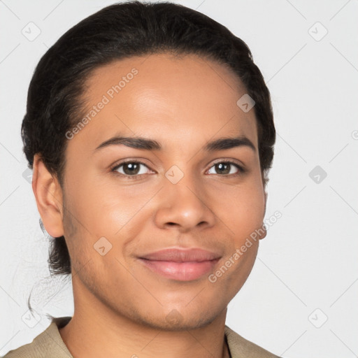 Joyful latino young-adult male with short  brown hair and brown eyes