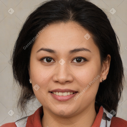 Joyful latino young-adult female with medium  brown hair and brown eyes