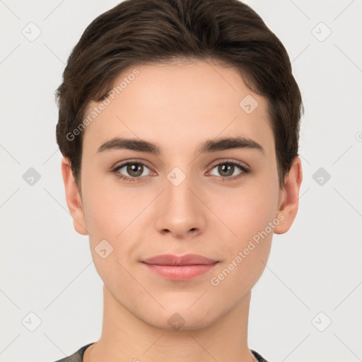 Joyful white young-adult female with short  brown hair and brown eyes