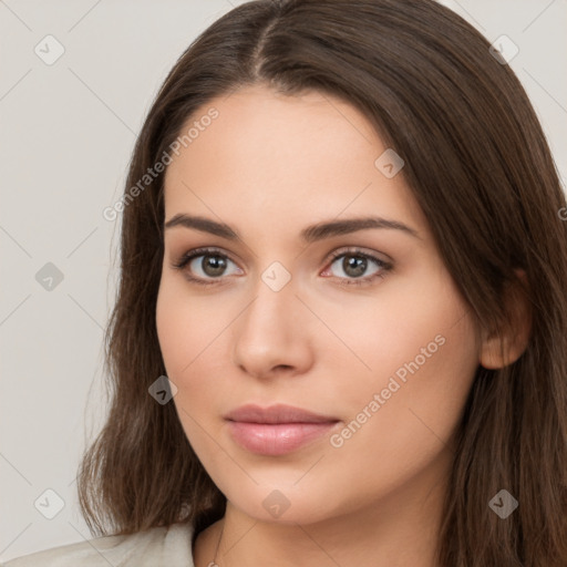 Neutral white young-adult female with long  brown hair and brown eyes