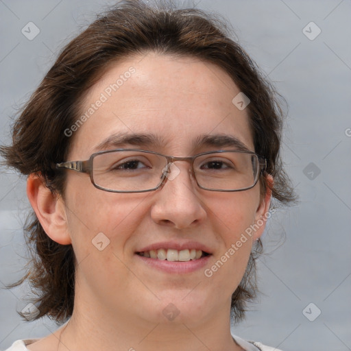 Joyful white adult female with medium  brown hair and brown eyes