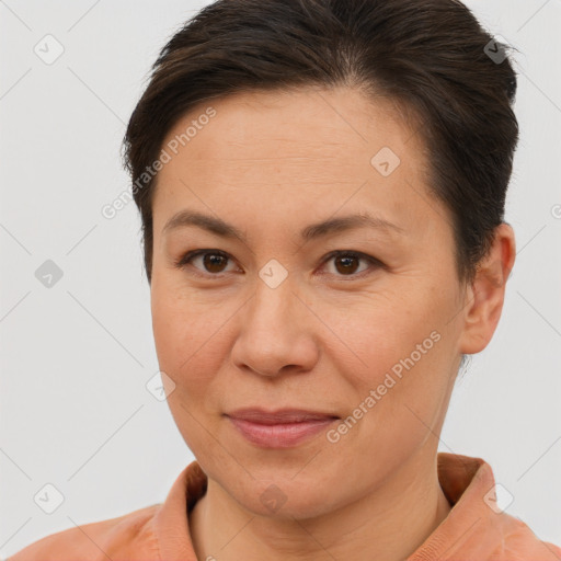 Joyful white adult female with short  brown hair and brown eyes