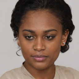 Neutral black young-adult female with short  brown hair and brown eyes