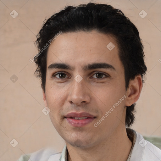 Joyful white young-adult male with short  black hair and brown eyes