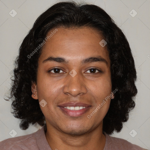 Joyful black young-adult female with medium  brown hair and brown eyes