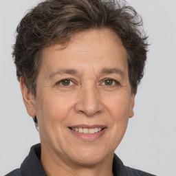 Joyful white middle-aged female with short  brown hair and brown eyes