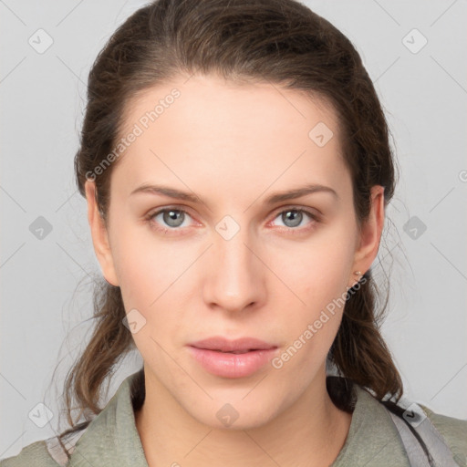 Neutral white young-adult female with medium  brown hair and grey eyes