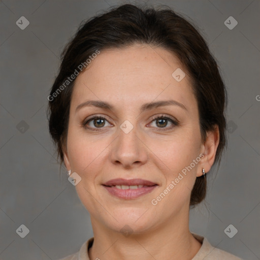 Joyful white adult female with medium  brown hair and brown eyes