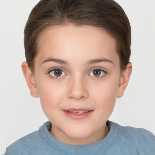 Joyful white child female with short  brown hair and brown eyes