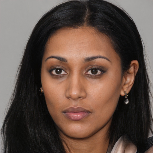 Neutral asian young-adult female with long  brown hair and brown eyes