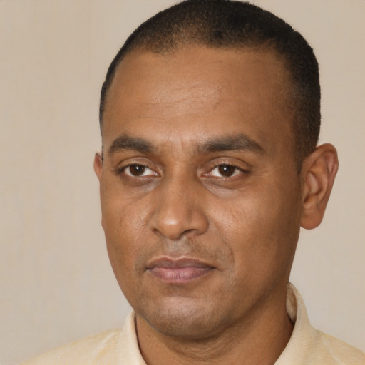 Neutral black adult male with short  black hair and brown eyes