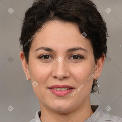 Joyful white adult female with short  brown hair and brown eyes