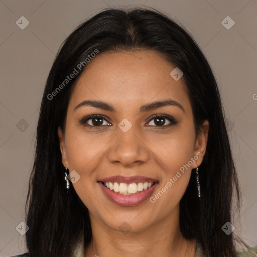 Joyful latino young-adult female with long  brown hair and brown eyes