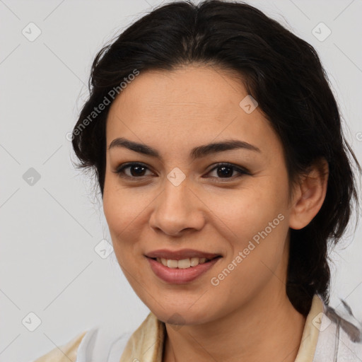 Joyful latino young-adult female with medium  brown hair and brown eyes