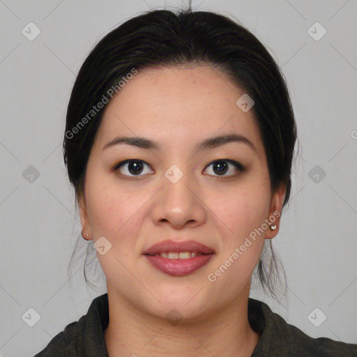 Joyful asian young-adult female with medium  black hair and brown eyes