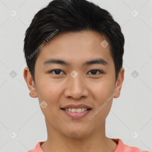 Joyful asian young-adult male with short  black hair and brown eyes