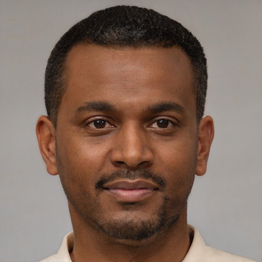 Neutral black young-adult male with short  brown hair and brown eyes