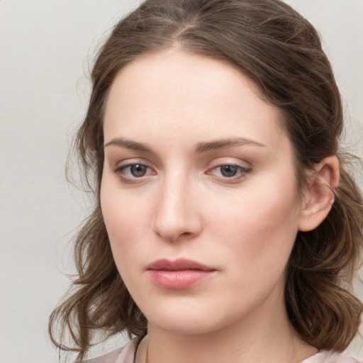 Neutral white young-adult female with medium  brown hair and grey eyes