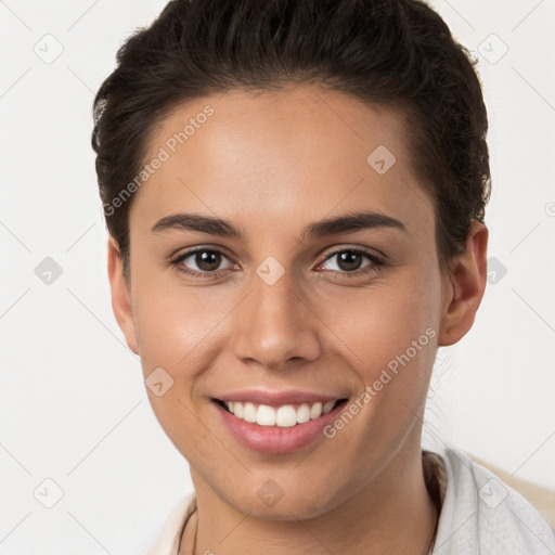 Joyful white young-adult female with short  brown hair and brown eyes