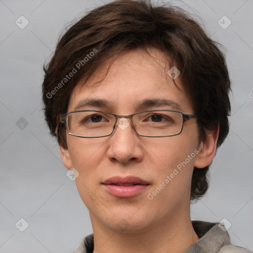 Joyful white adult female with short  brown hair and grey eyes