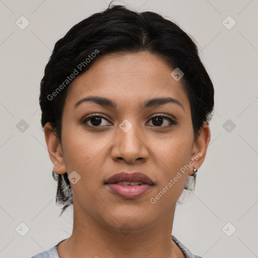 Joyful latino young-adult female with short  brown hair and brown eyes